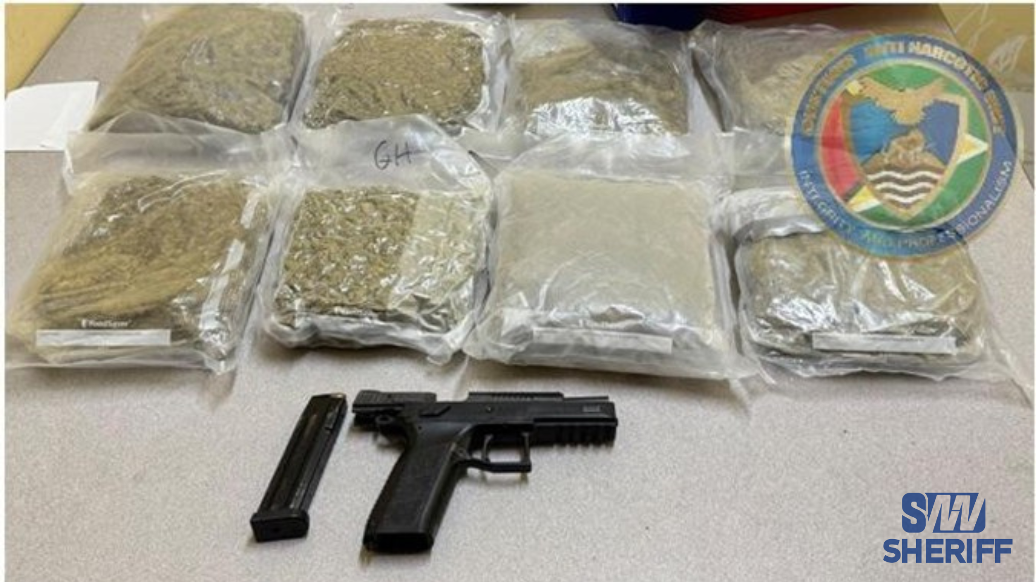 Gun, ammo & over 3.8kg of ganja seized near Mandela hotel