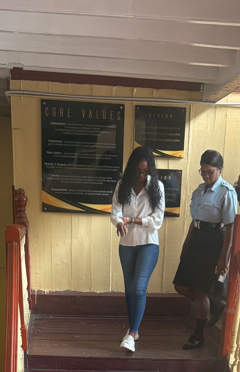 Mother of two granted $45,000 bail for threats, assault at police station